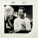A framed photograph of Mike Hawthorn and Peter Collins with signatures,