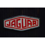 A cold cast 'Jaguar' garage display emblem,