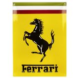 A 'Ferrari' enamel sign,