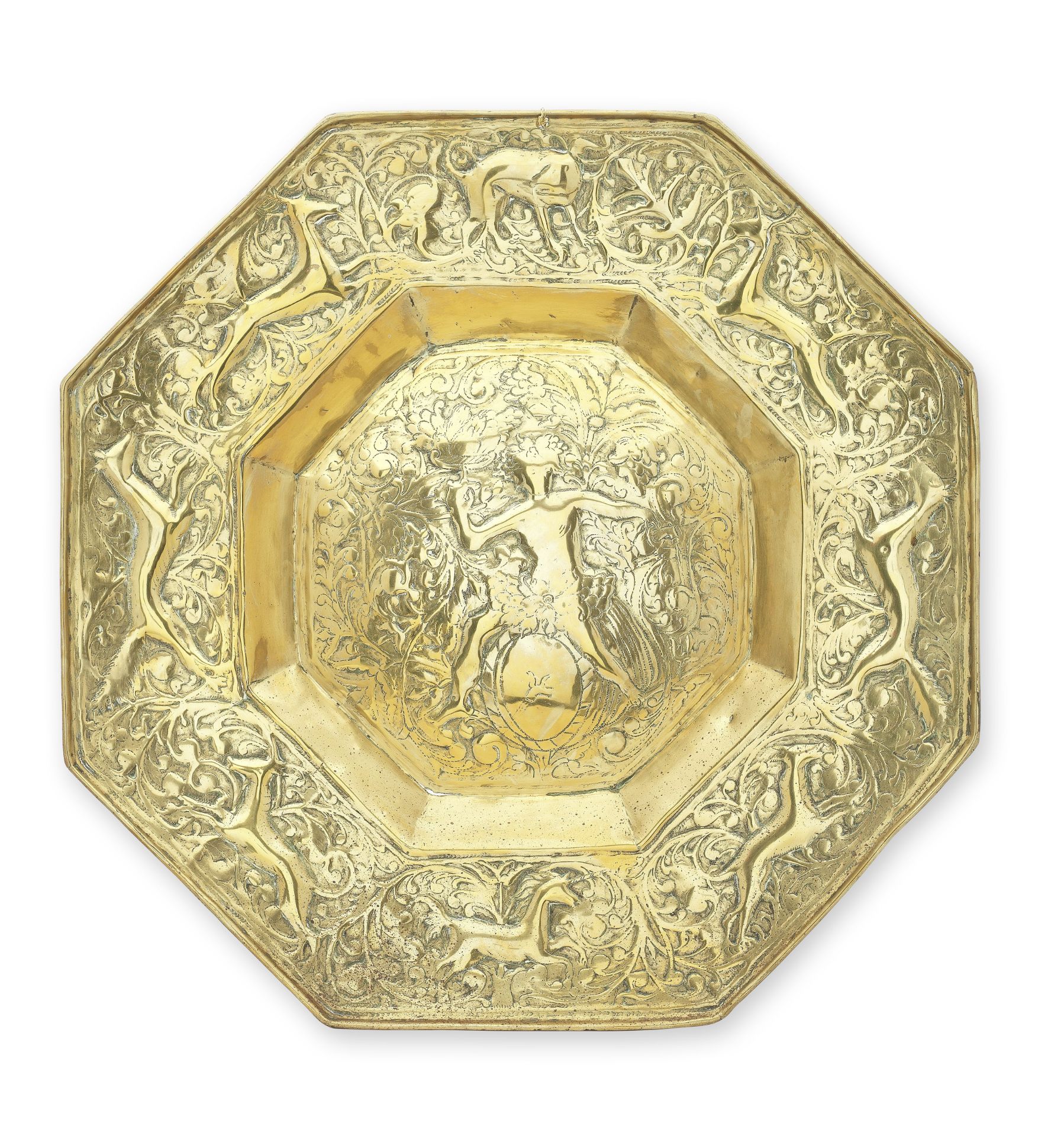 A large embossed brass octagonal mural reflector, Scandinavian, circa 1680