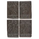 A rare set of four mid-16th century carved oak portrait panels, English, circa 1550 (4)