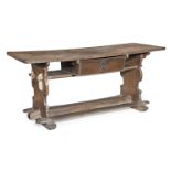 An interesting 17th century oak trestle-end table, German