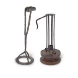 An 18th century wrought iron and beech 'stable' or 'birdcage' ejector candlestick, European (2)