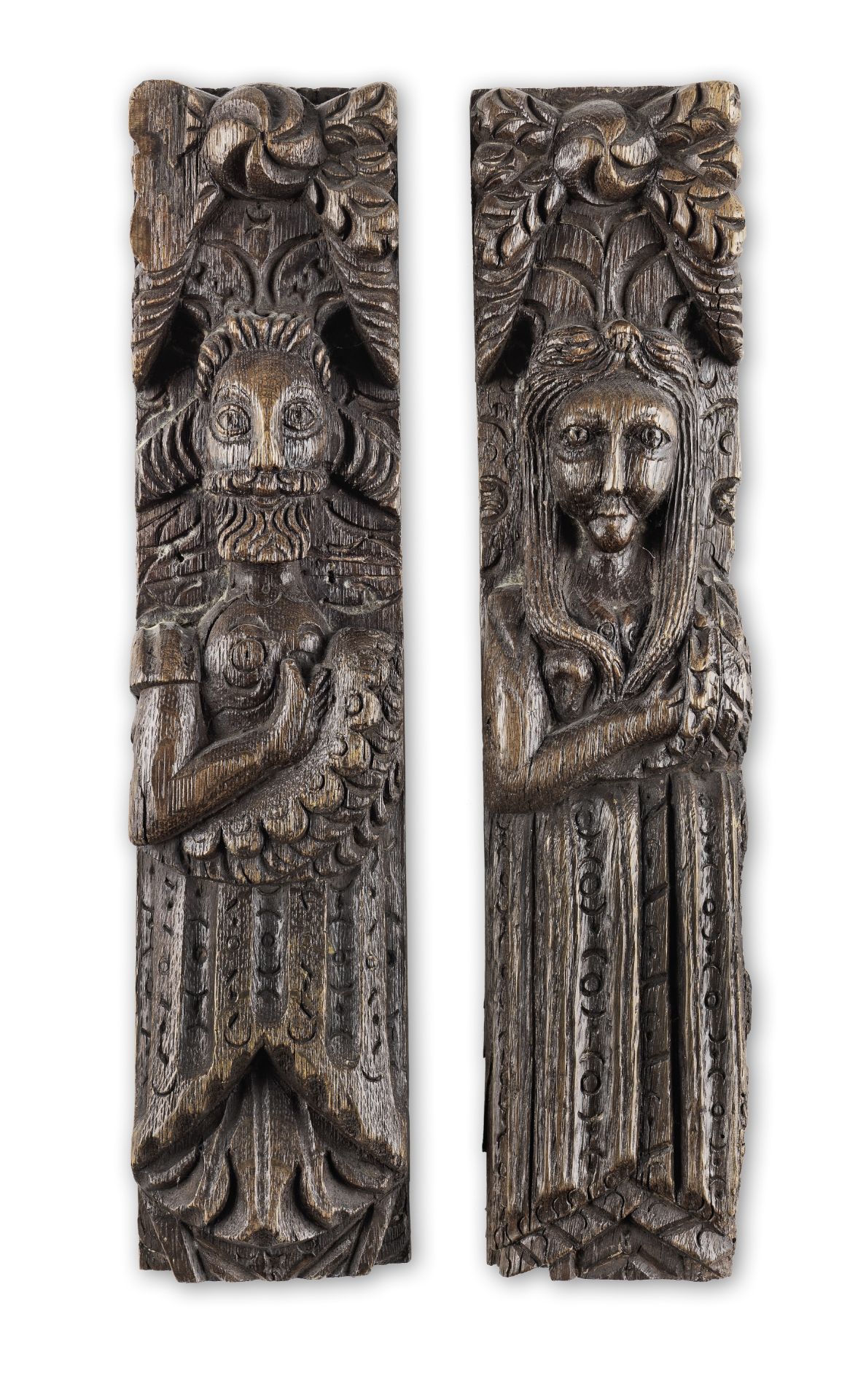 A pair of James I carved oak figural terms, circa 1620 (2)