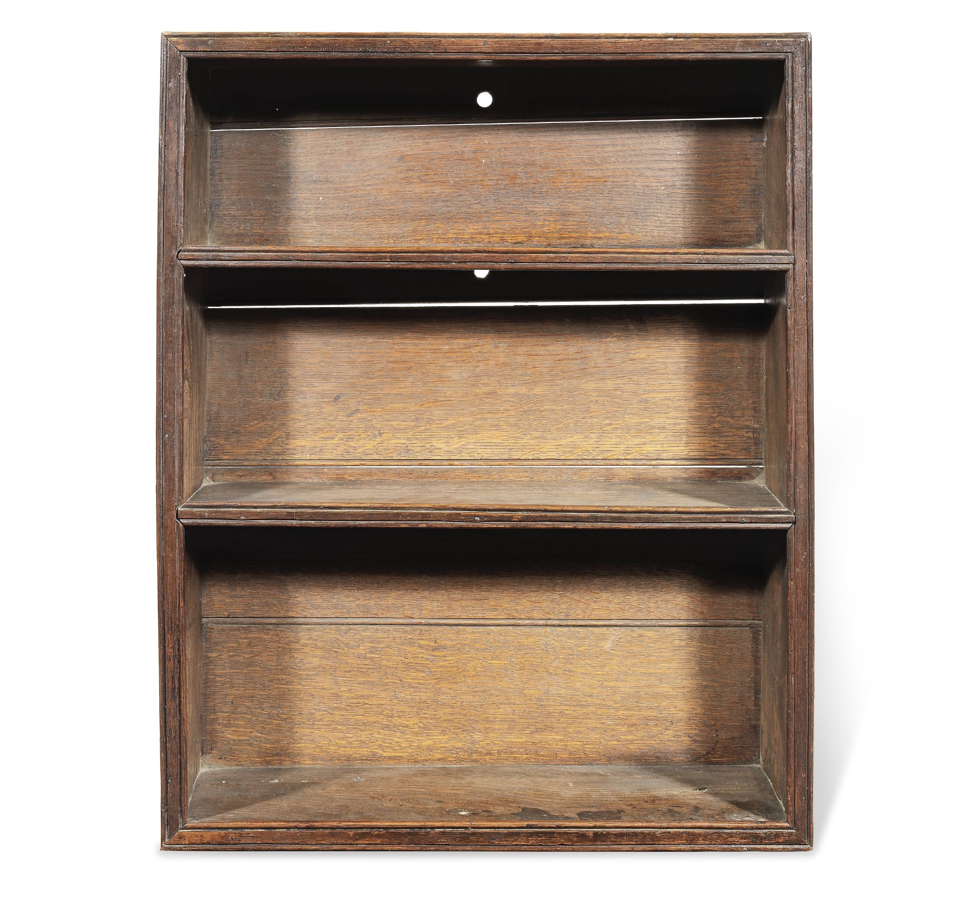 A set of small George III boarded elm and oak open mural shelves, circa 1810