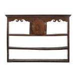 An unusual George III elm delft rack, with cupboard, circa 1760