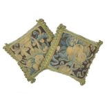 A pair of 17th century verdure tapestry cushions, Flemish (2)