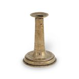 A small mid- to late 17th century brass-alloy trumpet-based socket candlestick, circa 1650-80