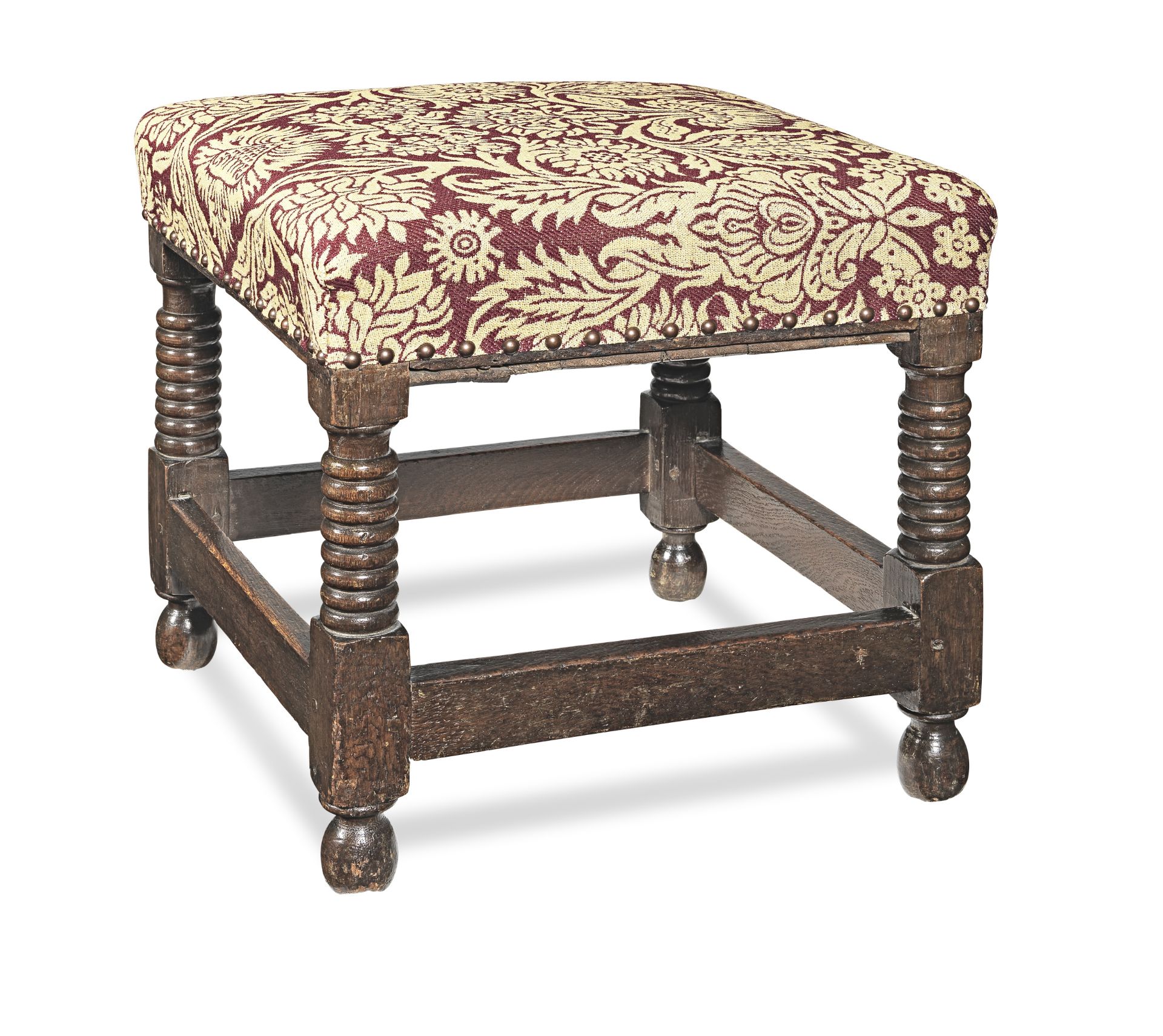 A Charles II joined oak and upholstered stool, circa 1680