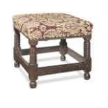 A Charles II joined oak and upholstered stool, circa 1680