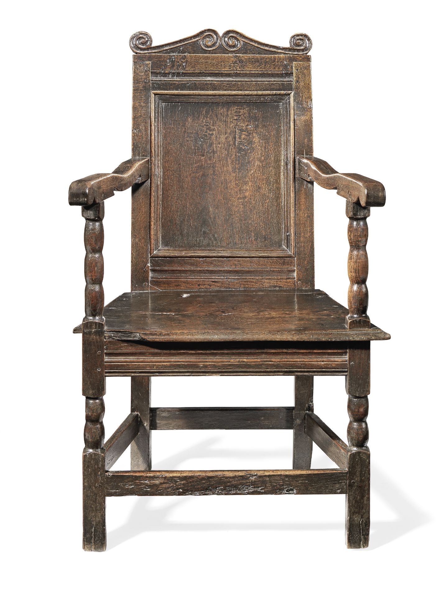 A Charles II joined oak panel-back open armchair, Yorkshire, circa 1670