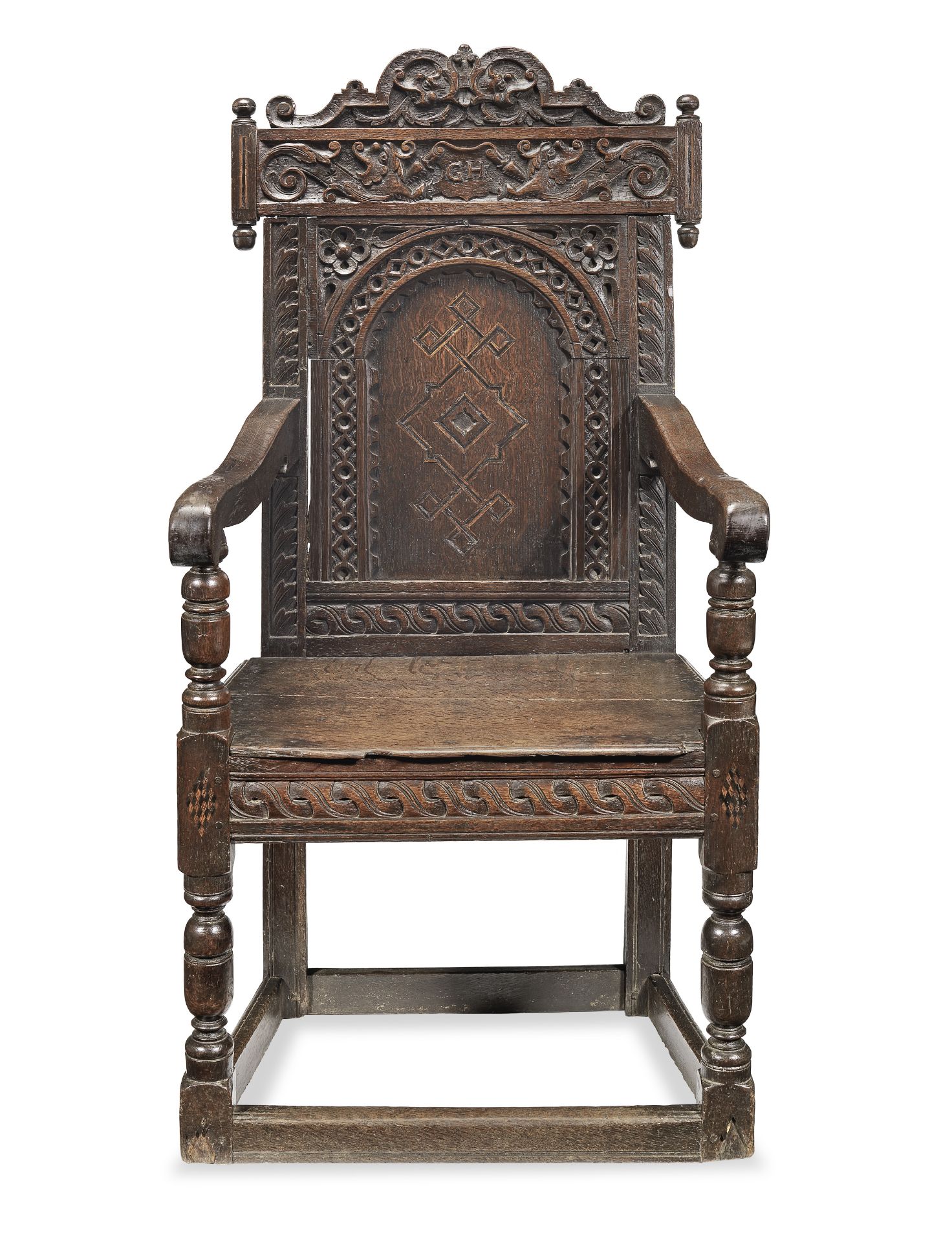 A splendid Elizabeth I joined oak and inlaid panel-back open armchair, Gloucestershire, circa 1600
