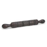 A 19th century carved fruitwood rolling pin, for butter or paste, Welsh