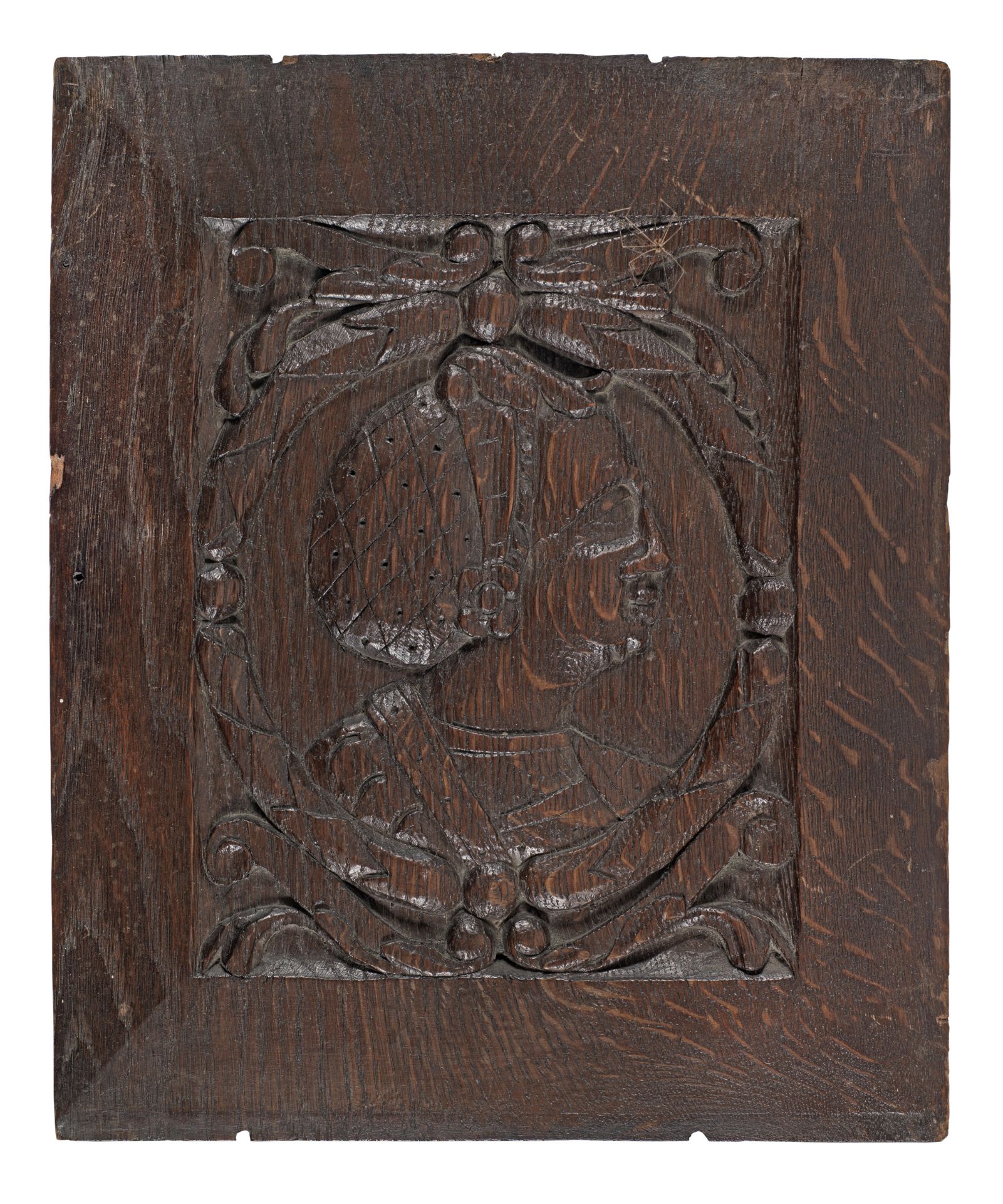 A small carved oak 'Romayne'-type panel, circa 1540
