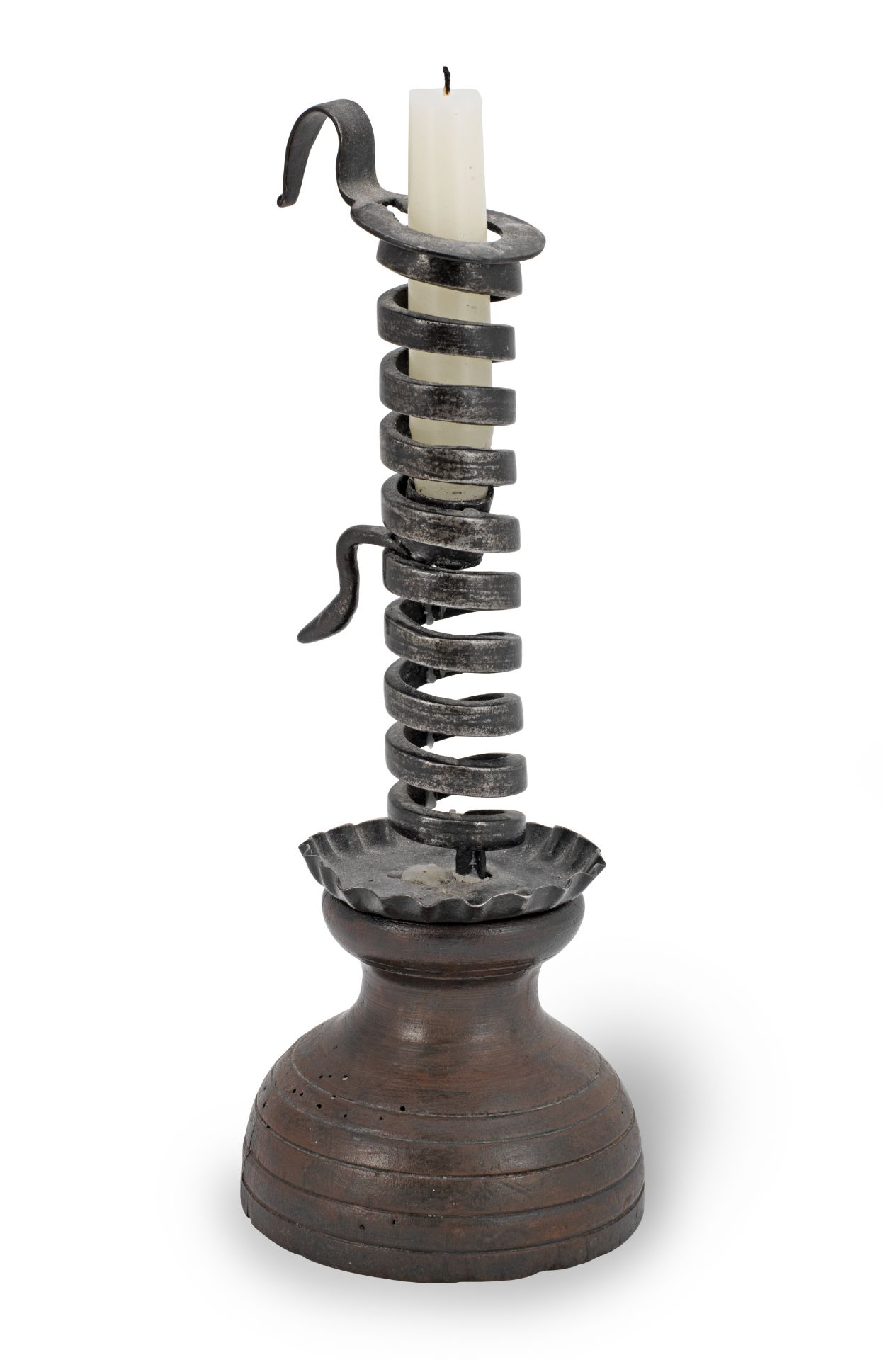 A 19th century wrought iron spiral candlestick on a painted beech base, French