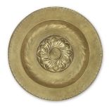 A mid- to late 16th century brass alms dish, Nuremberg, circa 1500-1550