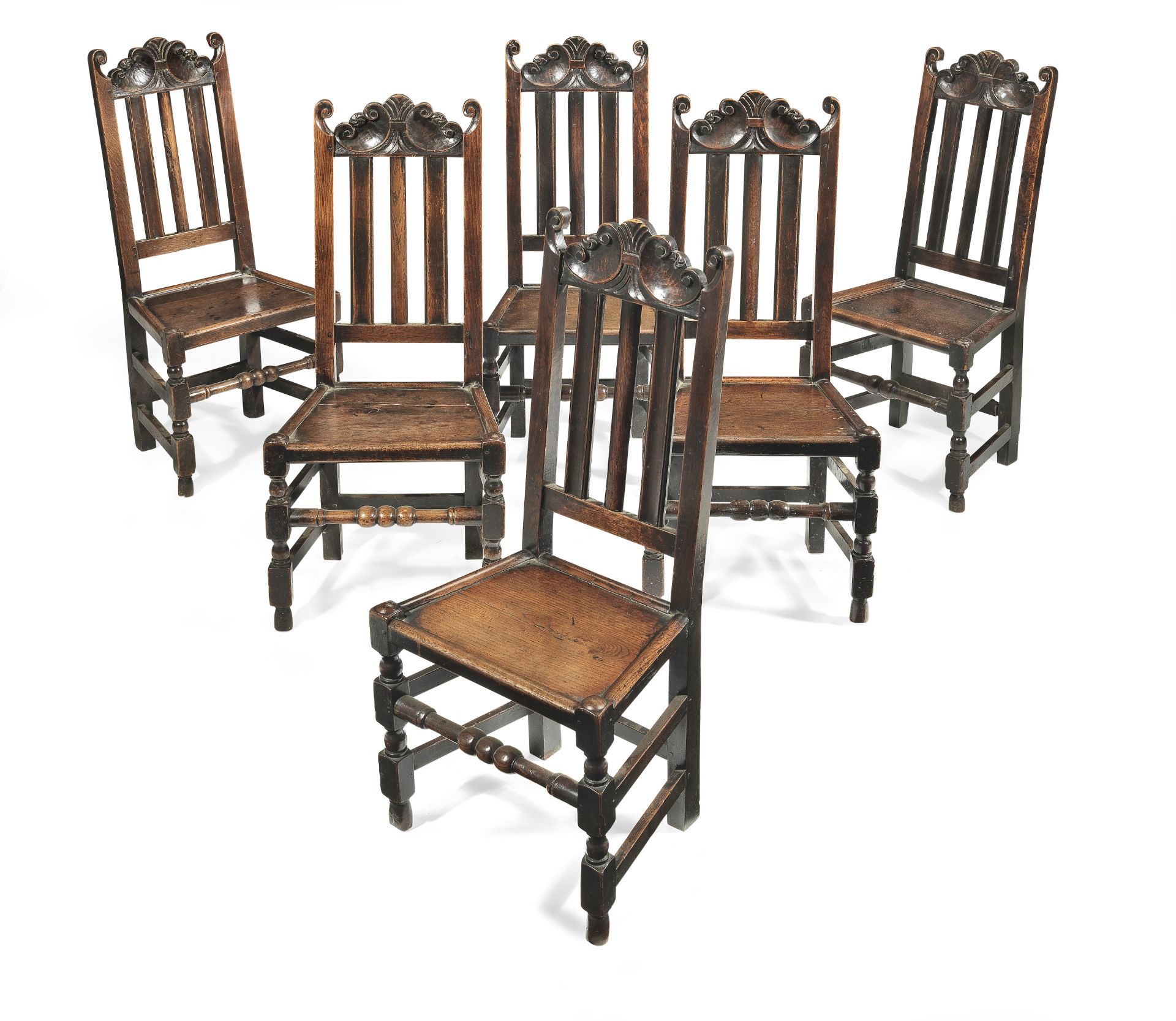 A very near-set of six late 17th century joined oak high-back chairs, English, circa 1685 (6)