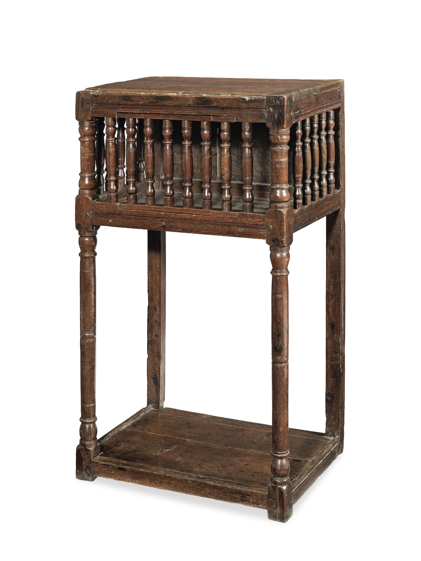 A rare and documented Charles II joined oak standing ventilated livery cupboard, circa 1680