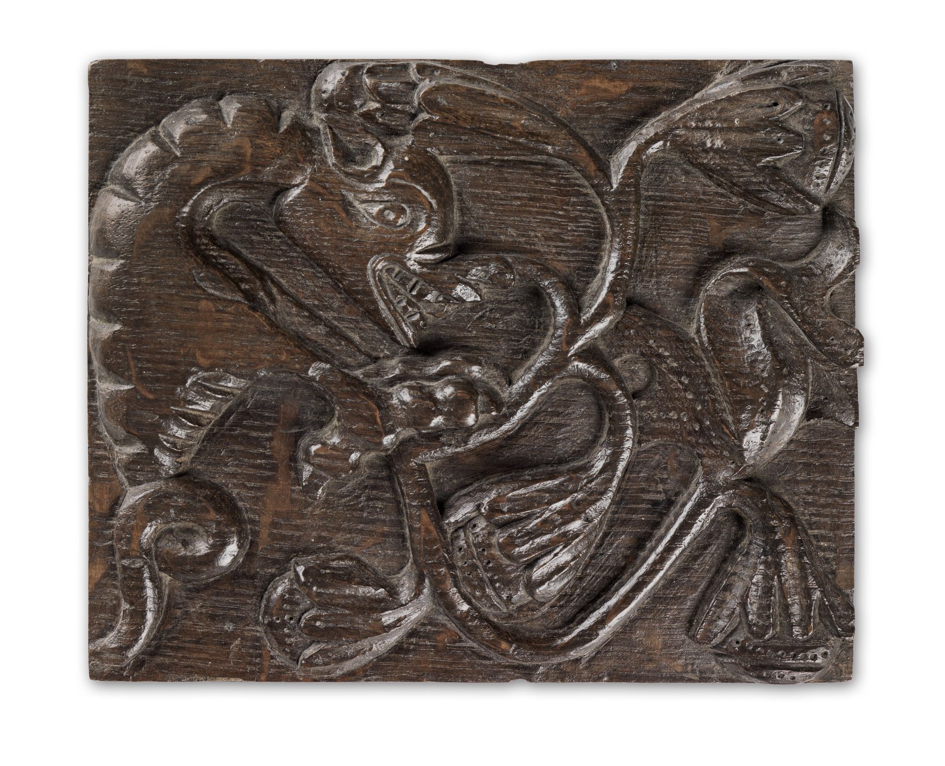 A small Henry VIII carved oak panel, English, circa 1530