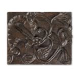 A small Henry VIII carved oak panel, English, circa 1530