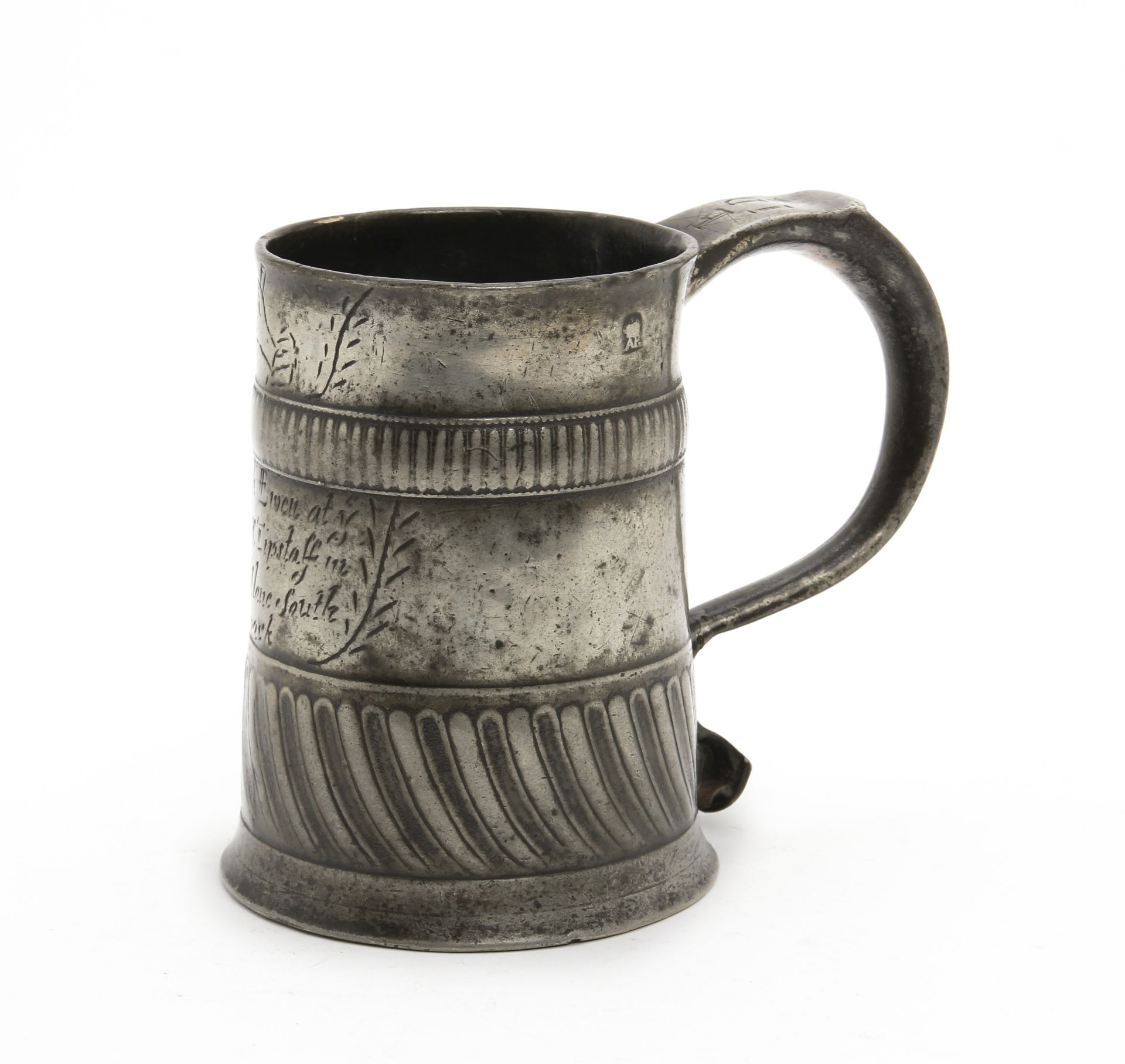 An extremely rare and fine Queen Anne pewter gadrooned mug, ale-pint capacity, circa 1705