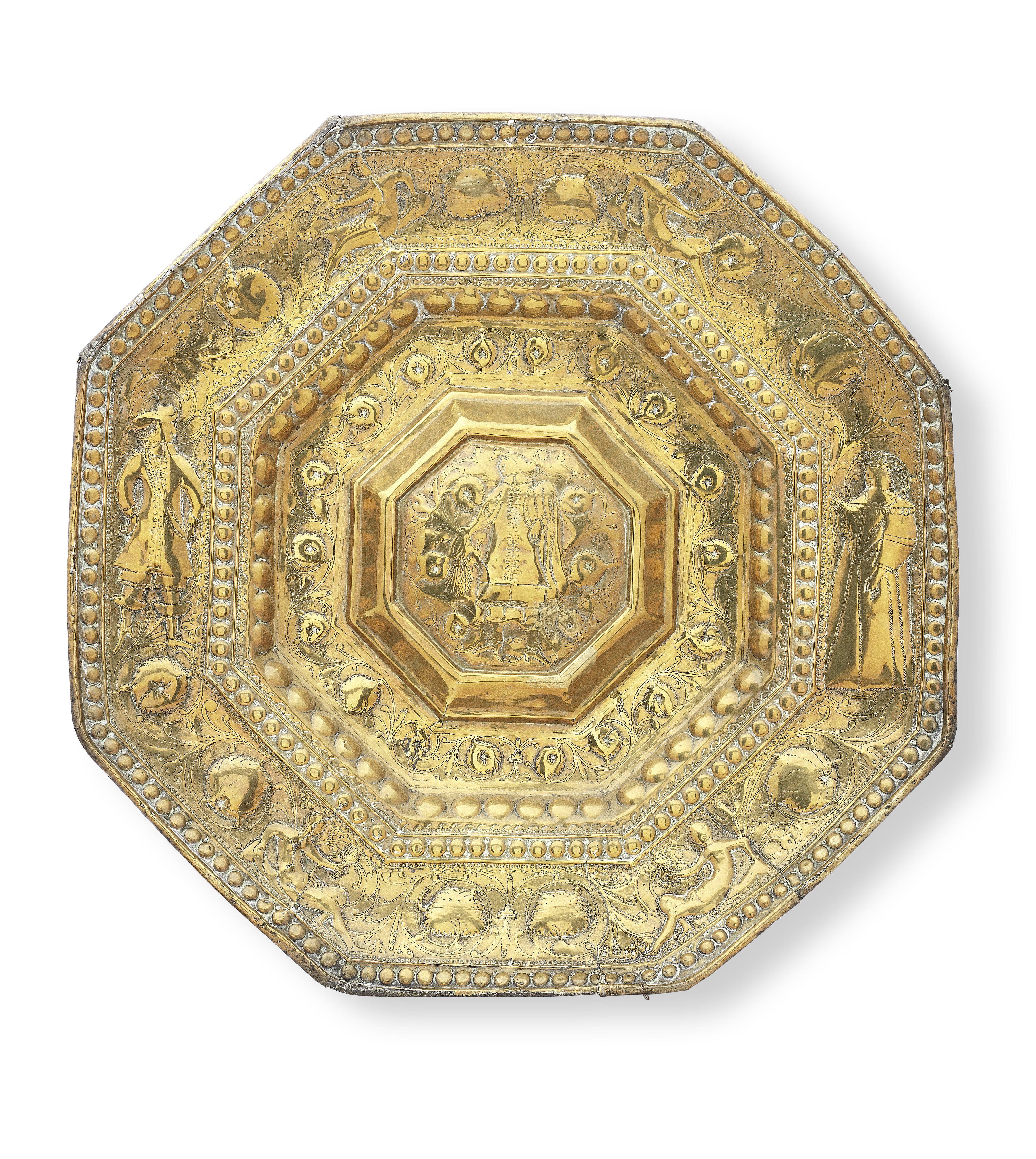 A large embossed brass octagonal mural reflector, Scandinavian, circa 1680