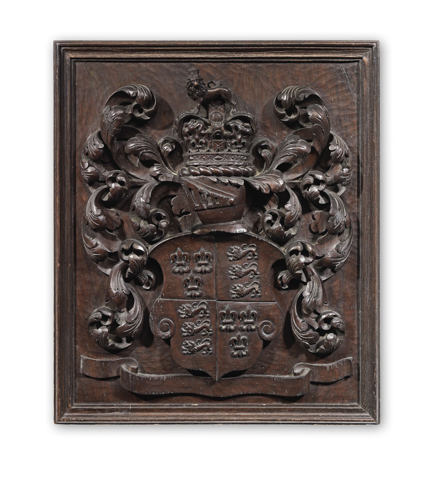 A 19th century carved walnut coat of arms