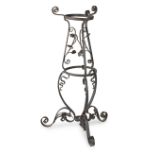 A wrought iron brazier stand