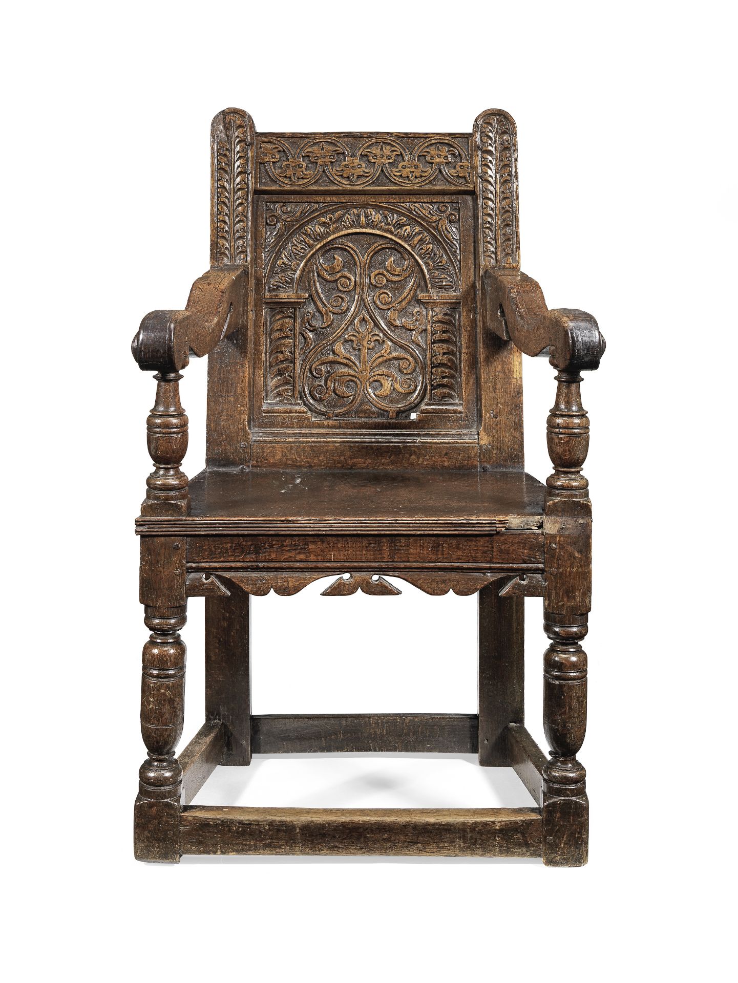 A James I/Charles I joined oak panel back armchair, Devon, circa 1620-30