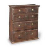 A small Queen Anne oak 'table-top' chest of drawers, circa 1710