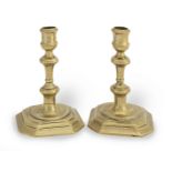 A pair of George I brass socket candlesticks, circa 1720 (2)