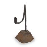 An early to mid-19th century iron rushlight holder, Irish, circa 1800-50