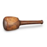 A large lignum vitae pestle