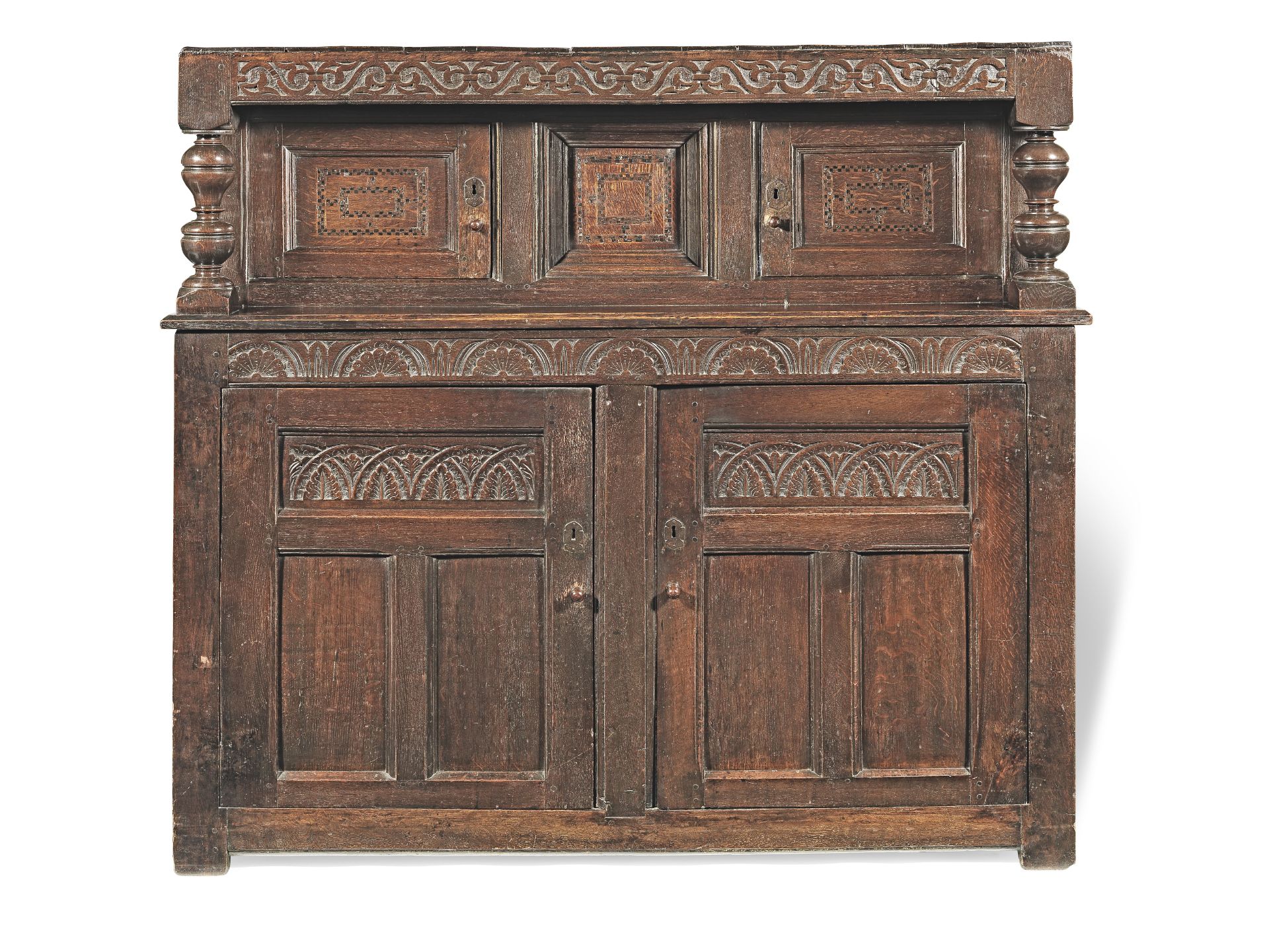 A Charles I joined oak and inlaid court cupboard, Yorkshire/Derbyshire, circa 1640