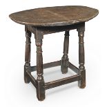 A Charles I oak joint stool, historically adapted using an 18th century oak table-top