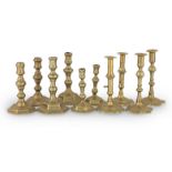 Five pairs of late 17th/early 18th century copper alloy or brass socket candlesticks, English and...
