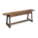 A joined oak long bench or form, English Circa 1640 and later