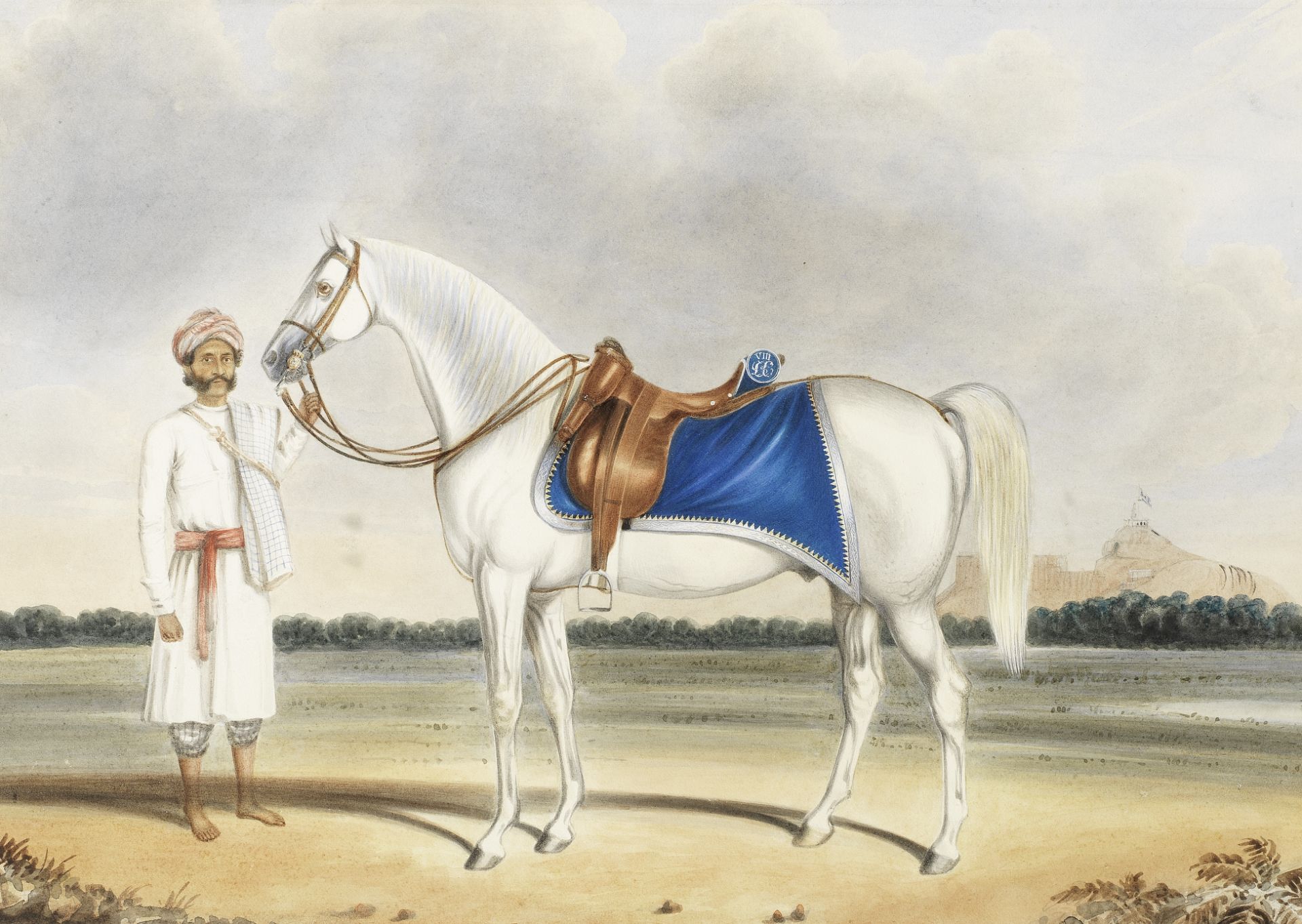 A grey horse of the Madras Light Cavalry standing in a landscape with its groom, with the fort of...