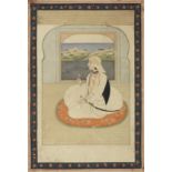 Raja Anidrudh Singh, son of Sansar Chand of Kangra, dressed in Sikh attire, seated holding a flow...