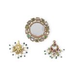 A gem-set gold forehead pendant (chand-tikka), a gem-set gold mirrored roundel and a pearl-mounte...