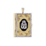 A diamond and ruby-set Qur'an case pendant containing a miniature Qur'an Retailed by Adler, Genev...