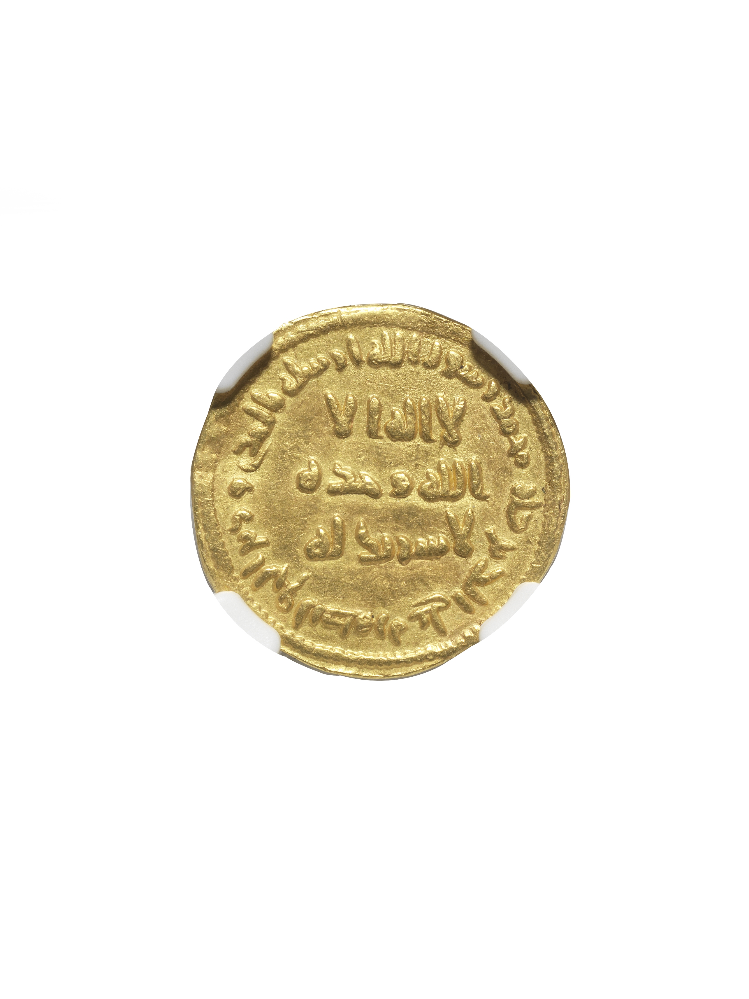 An Umayyad Gold Dinar from the reign of 'Abd al-Malik (AD 685-705) probably Damascus, dated AH 77...