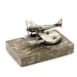 A small 'Schneider Trophy Seaplane' mascot,