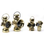 Four early motoring brass lamps, ((4))