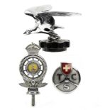 Two badges and an Alvis eagle mascot, ((3))