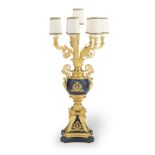 An impressive Italian, gilt bronze and lapis lazuli eight light candelabrum in the Neo Classical...