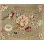 A silk and wool embroidered and appliqued felt panel depicting a bull finch and a floral bouquet ...