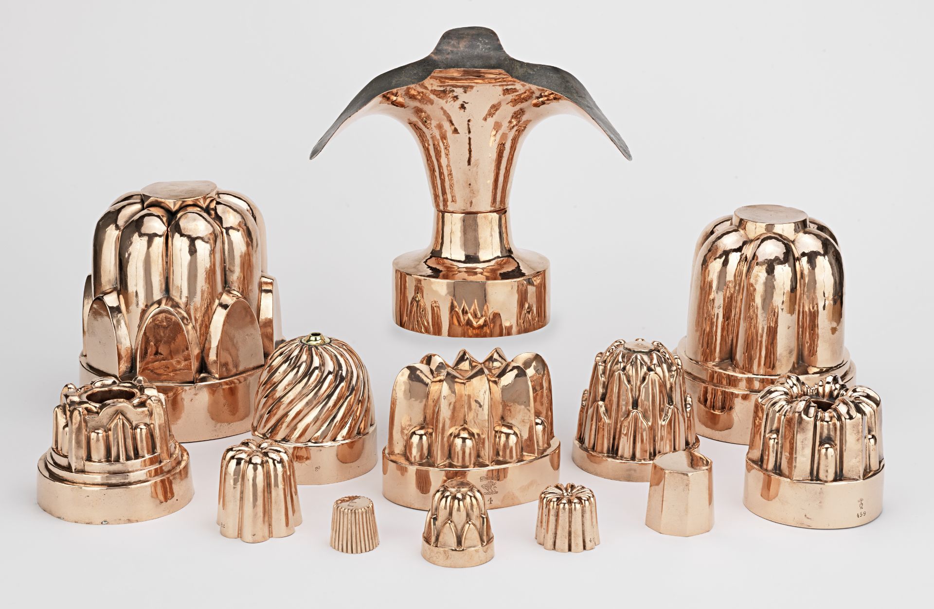 A good collection of 19th century copper jelly, confectionery and ice cream moulds (12)