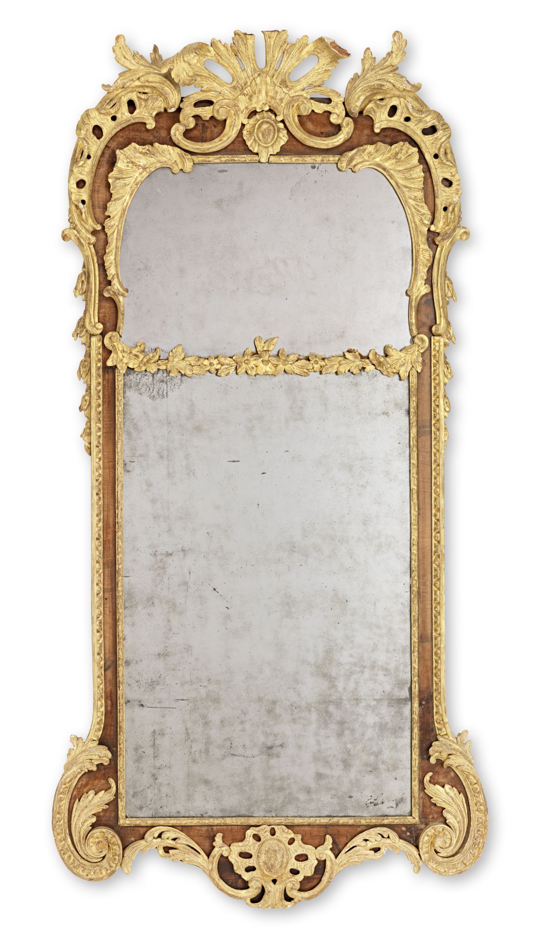 A 19th century walnut and parcel gilt mirror in the George II style