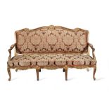 A French 19th century giltwood canape in the Louis XV style